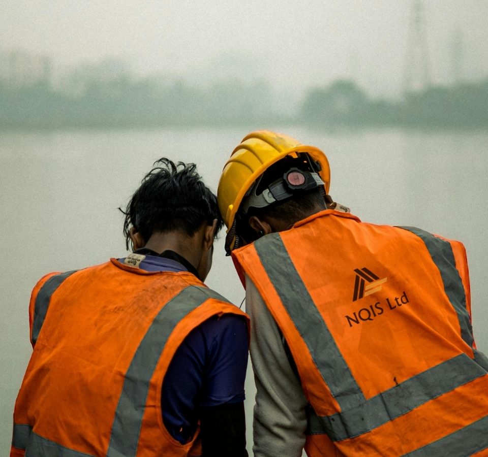 NQIS operatives reviewing plans